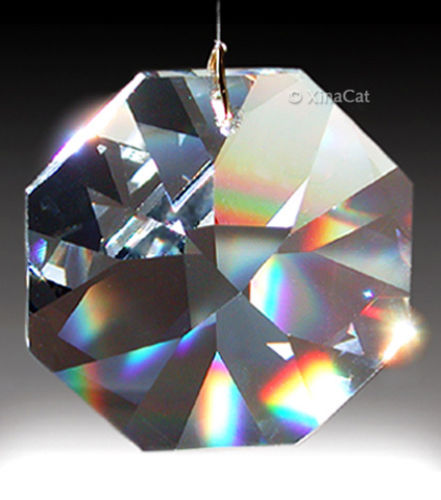 This octagon crystal has large facets and can make large beautiful rainbows. Photo courtesy Laura Hoffman, XinaCat.com.