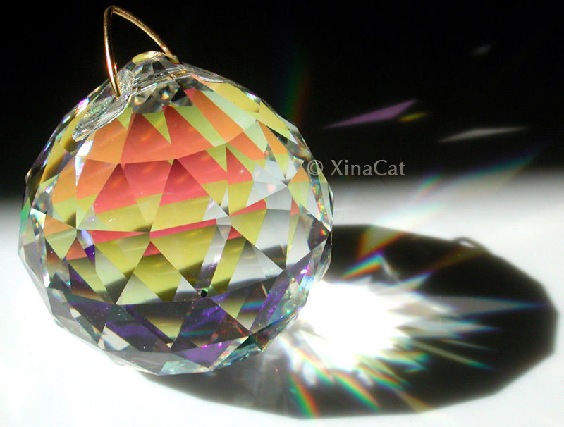 This crystal has an iridescent coating. Photo courtesy Laura Hoffman, XinaCat.com.