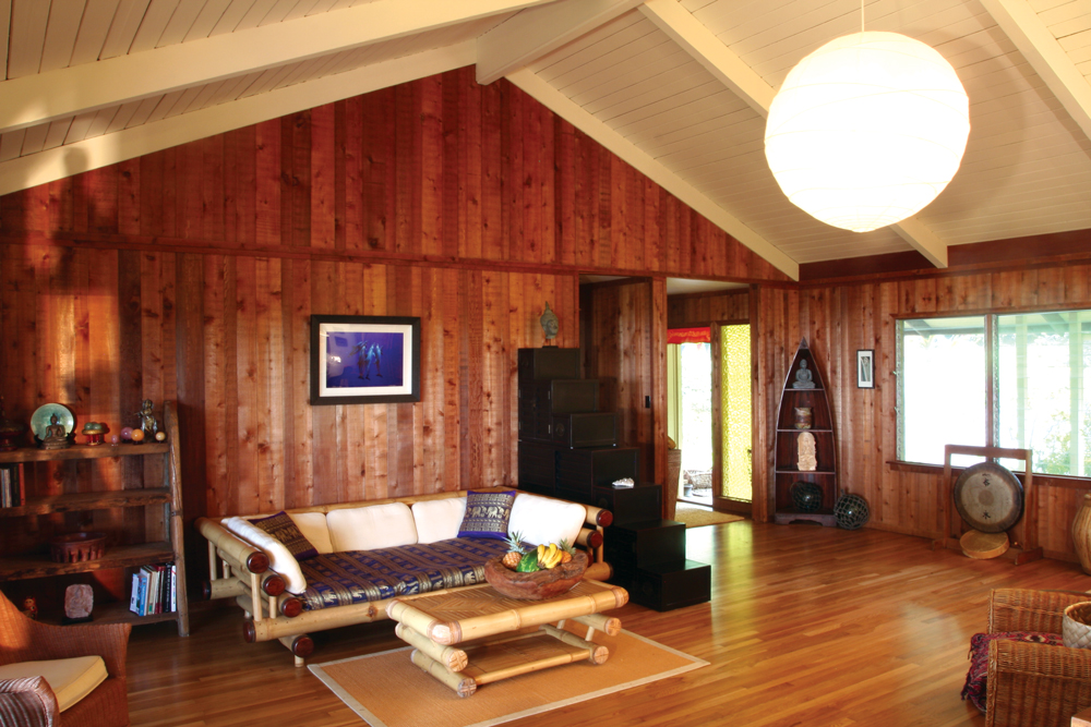 This room is ready for a showing—there is a nice flow to the furniture, the room is not too cluttered, but not empty, and the personal possessions are limited to a smattering of nice objects that aren't overly specific to the owners. The bowl of fresh fruit on the table is a nice touch.