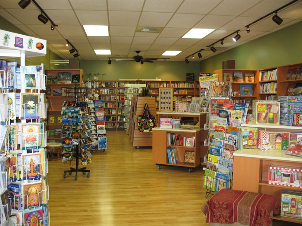 Interior of retail bookstore with racks and shelves of books